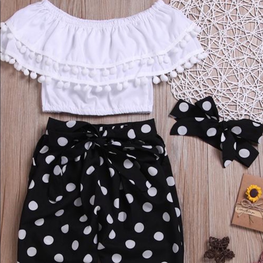 Off the shoulder top and polka dot tie crop pants